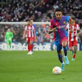 Barcelona's Pierre-Emerick Aubameyang runs with the ball during the Spanish league football match between FC Barcelona and Club Atletico de Madrid at the Camp Nou stadium in Barcelona on February 6, 2022