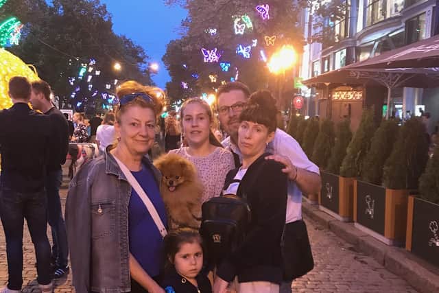 From left, Tatiana Orzherevskaya, with two of her grandchildren, her son-in-law, Daniel Cojac, and daughter Natalia. Photo: Supplied