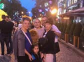 From left, Tatiana Orzherevskaya, with two of her grandchildren, her son-in-law, Daniel Cojac, and daughter Natalia. Photo: Supplied