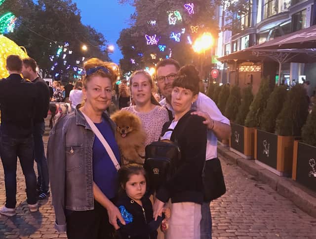 From left, Tatiana Orzherevskaya, with two of her grandchildren, her son-in-law, Daniel Cojac, and daughter Natalia. Photo: Supplied
