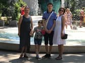 Tatiana, left, with two of her grandchildren, and daughter Natalia. Photo: Supplied