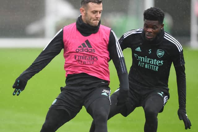 Jack Wilshere and Thomas Partey of Arsenal during a training session at London Colney on February 15, 2022 in St Albans, England. (Photo by Stuart MacFarlane/Arsenal FC via Getty Images)