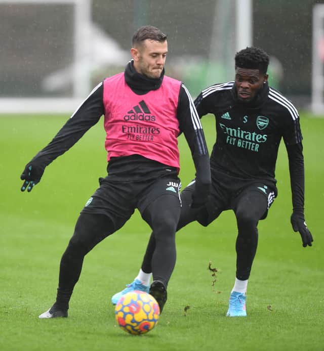 Jack Wilshere and Thomas Partey of Arsenal during a training session at London Colney on February 15, 2022 in St Albans, England. (Photo by Stuart MacFarlane/Arsenal FC via Getty Images)