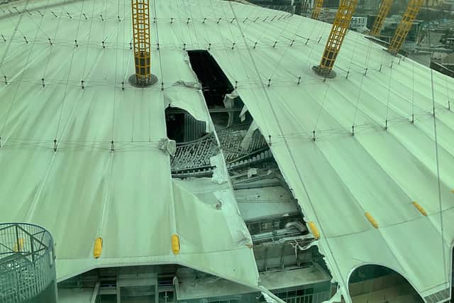 The O2 arena roof is ripping away in the wind. Photo: Sharon Forbes /@BlondeMzungu