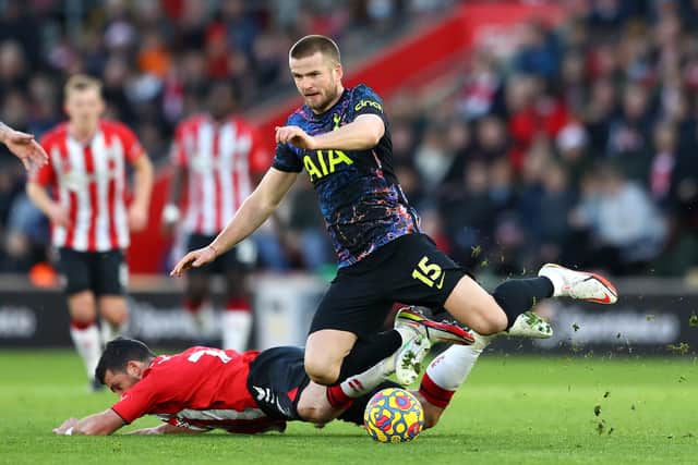 Shane Long of Southampton battles for possession with Eric Dier (Photo by Michael Steele/Getty Images)