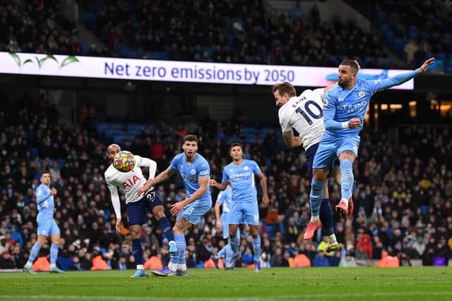 Spurs player Harry Kane heads to score the third Tottenham goal (Photo by Stu Forster/Getty Images)