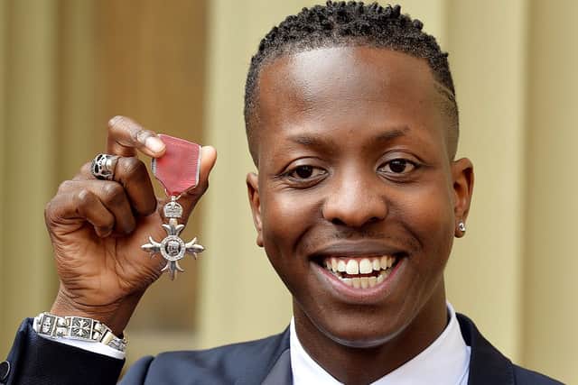 Edwards holds his Member of the Order of the British Empire (MBE) medal after it was awarded to him by Prince Charles at Buckingham Palace in 2015 (Photo: JOHN STILLWELL/AFP via Getty Images)