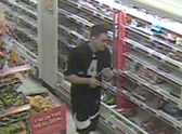 A CCTV still showing Leoaai Elghareeb injecting blood into food at three supermarkets. Credit: SWNS