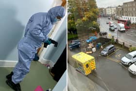  A forensic officer (L) & an ambulance (R) parked outside the building.  The body of a skeleton has been found in a London flat - after reports of a bad smell for over two YEARS, neighbours said. Credit: SWNS
