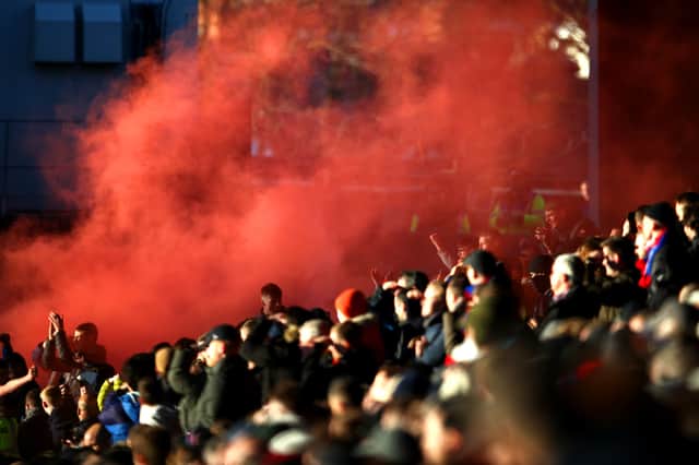 Crystal Palace fans show their support during the Premier League match . (Photo by Christopher Lee/Getty Images)