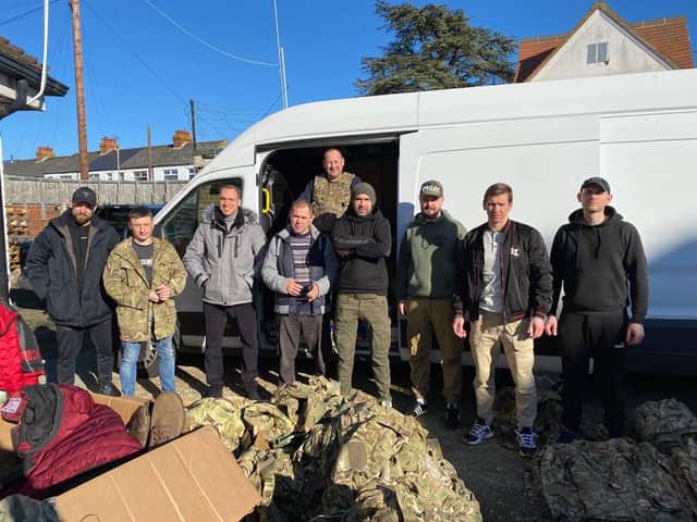 A group of volunteers delivering military supplies to the frontline