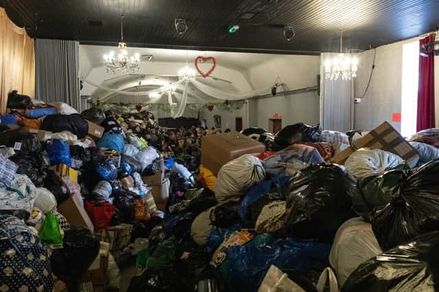 The main hall filled with donations that will go to Ukraine at The White Eagle Club in Balham. Credit: SWNS