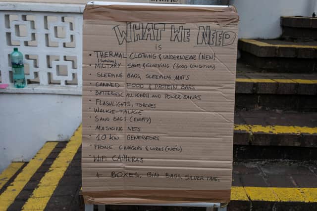 A list of items needed to be donated to send to Ukraine, at the White Eagle Club outside the building in Balham. Credit: SWNS