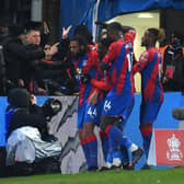  Jairo Riedewald of Crystal Palace celebrates their sides second goal with team mates (Photo by Tom Dulat/Getty Images)
