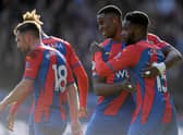 Jeffrey Schlupp of Crystal Palace celebrates with Marc Guehi after scoring their side’s  (Photo by Tom Dulat/Getty Images)
