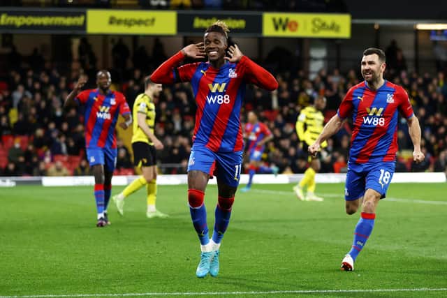 Wilfried Zaha celebrates with teammate James McArthur of Crystal Palace after scoring . (Photo by Paul Harding/Getty Images)