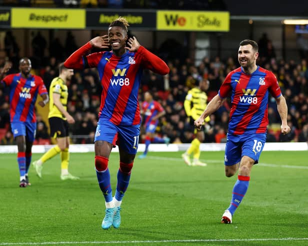 Wilfried Zaha celebrates with teammate James McArthur of Crystal Palace after scoring . (Photo by Paul Harding/Getty Images)