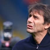 Tottenham Hotspur's Italian head coach Antonio Conte walks on the pitch ahead of the English Premier League  (Photo by JON SUPER/AFP via Getty Images)