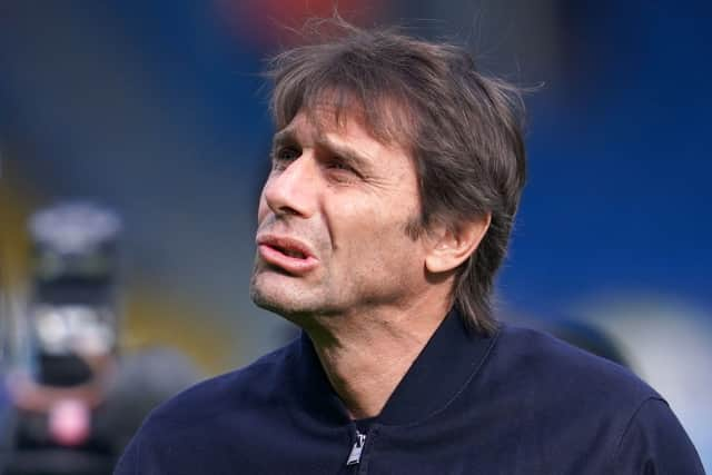 Tottenham Hotspur's Italian head coach Antonio Conte walks on the pitch ahead of the English Premier League  (Photo by JON SUPER/AFP via Getty Images)