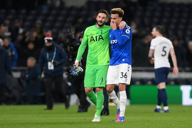 Hugo Lloris of Tottenham Hotspur interacts with Dele Alli of Everton after the Premier League match (Photo by Mike Hewitt/Getty Images)