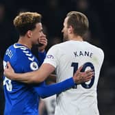 Dele Alli reacts with former teammate Tottenham Hotspur’s English striker Harry Kane on his first return to the Tottenham Hotspur Stadium since moving to Everton. Credit: BEN STANSALL/AFP via Getty Images