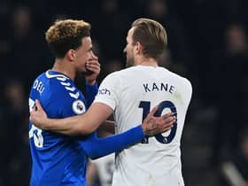 Dele Alli reacts with former teammate Tottenham Hotspur’s English striker Harry Kane on his first return to the Tottenham Hotspur Stadium since moving to Everton. Credit: BEN STANSALL/AFP via Getty Images