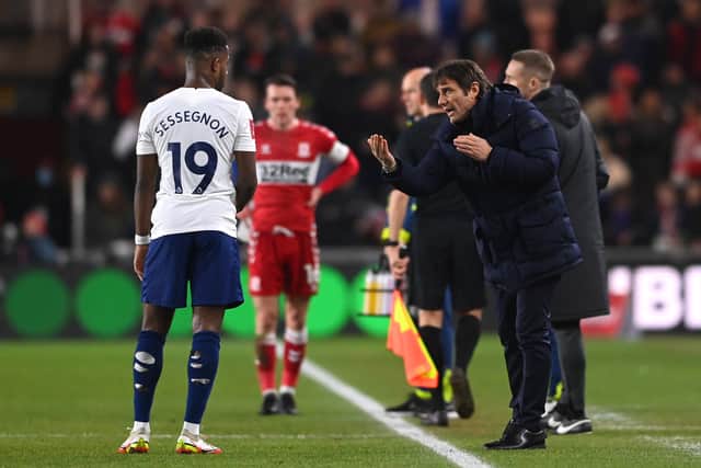 Antonio Conte, Manager of Tottenham Hotspur gives instructions to Ryan Sessegnon  (Photo by Stu Forster/Getty Images)