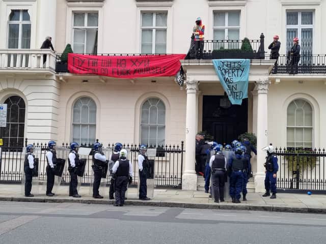 Protestors occupying 5 Belgrave Square, which is owned by the family of a sanctioned oligarch.
