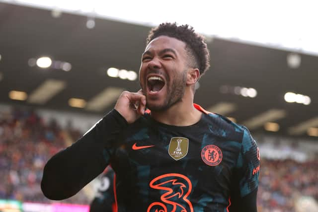 Reece James of Chelsea celebrates after scoring their team's first goal during the Premier League match Photo by Lewis Storey/Getty Images)