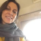 Nazanin Zaghari-Ratcliffe shares a photo of herself on board her flight home to the UK.