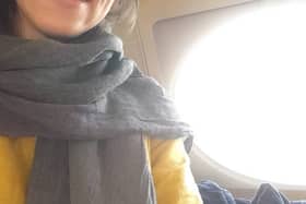 Nazanin Zaghari-Ratcliffe shares a photo of herself on board her flight home to the UK.