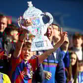 Crystal Palace fans celebrate with a tin foil FA Cup during the Emirates FA Cup  (Photo by Christopher Lee/Getty Images)