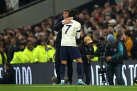 Heung-Min Son of Tottenham Hotspur celebrates with Antonio Conte  (Photo by Eddie Keogh/Getty Images)
