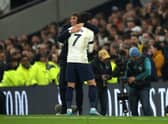 Heung-Min Son of Tottenham Hotspur celebrates with Antonio Conte  (Photo by Eddie Keogh/Getty Images)