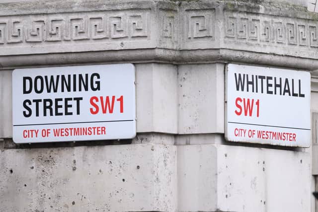 Street signs in Downing Street and Whitehall. Photo: Getty