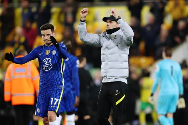 Thomas Tuchel and Saul Niguez of Chelsea celebrate with fans after their sides victory (Photo by Julian Finney/Getty Images)