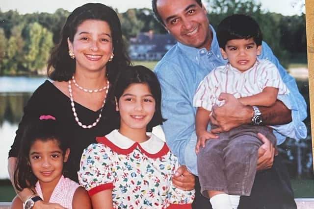 Family photo of Morad Tahbaz, as a younger man, with his family.