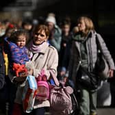 Ukrainian refugees arrived in Poland. Credit: Jeff J Mitchell/Getty Images