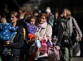 Ukrainian refugees arrived in Poland. Credit: Jeff J Mitchell/Getty Images