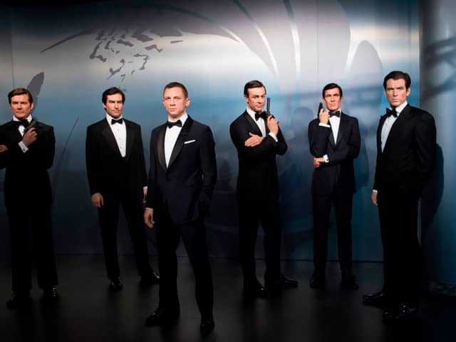 Wax figures of James Bond actors (L-R) Roger Moore, Timothy Dalton, Daniel Craig, Sean Connery, George Lazenby and Pierce Brosnan at Madame Tussauds (Photo: STEFFI LOOS/AFP via Getty Images)