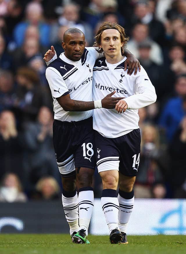 Jermain Defoe (L) of Tottenham Hotspur celebrates his second goal with Luka Modric. Credit: Richard Heathcote/Getty Images