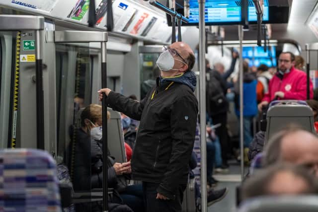 Volunteer ‘passengers’ travel on board a train during a test run of a Transport for London (TfL) Elizabeth Line train. Credit: NIKLAS HALLE'N/AFP via Getty Images