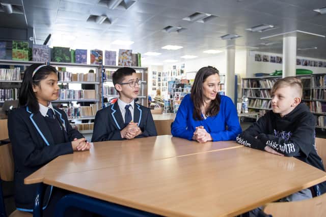Rani Hossain (year 7), Antonio-Valentin Cranga (year 7), Amy Brown (dep head) and Roman Kyrychenko (12). Credit: Ben Mole / SWNS