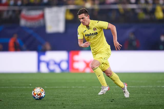 Giovani Lo Celso of Villarreal CF in action during the UEFA Champions League Round Of Sixteen Leg (Photo by Aitor Alcalde/Getty Images)
