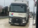 The lorry which has spilled concrete across the A406 eastbound between Bounds Green and Palmers Green. Credit: Ediz Mevlit