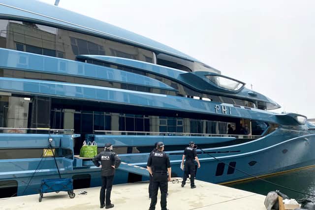 Following some fast-paced work by intelligence officers in the Cell, supported by colleagues from Border Force Maritime Intelligence Bureau, the ultimate owner of the vessel Phi was identified. Credit: NCA / SWNS