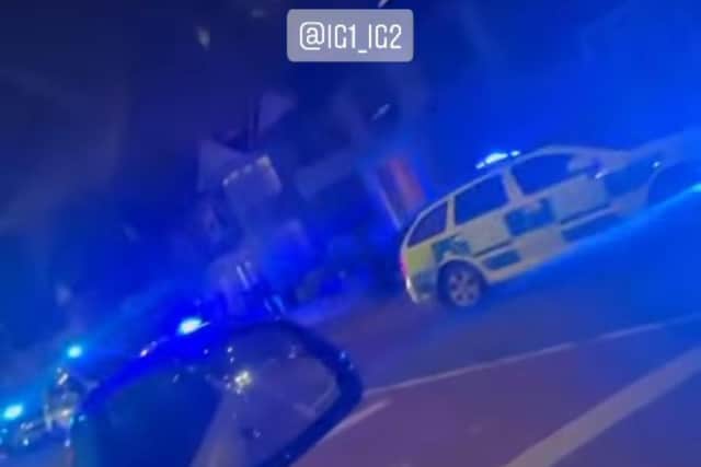Police cars outside the address in South Park Drive, Ilford. Credit: IG1_IG2