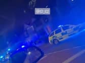 Police cars outside the address in South Park Drive, Ilford. Credit: IG1_IG2