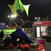 Extinction Rebellion activists at Esso West oil facility in west London at 04:00am this morning.