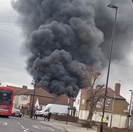 Smoke billows into the sky from the fire in Southall. Credit: Instagram @UB1UB2